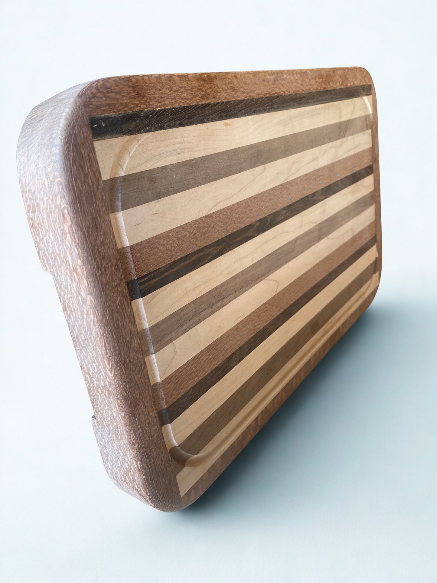 Exotic Hardwood Chef’s Cutting Board – Framed Drip-Edge Edition